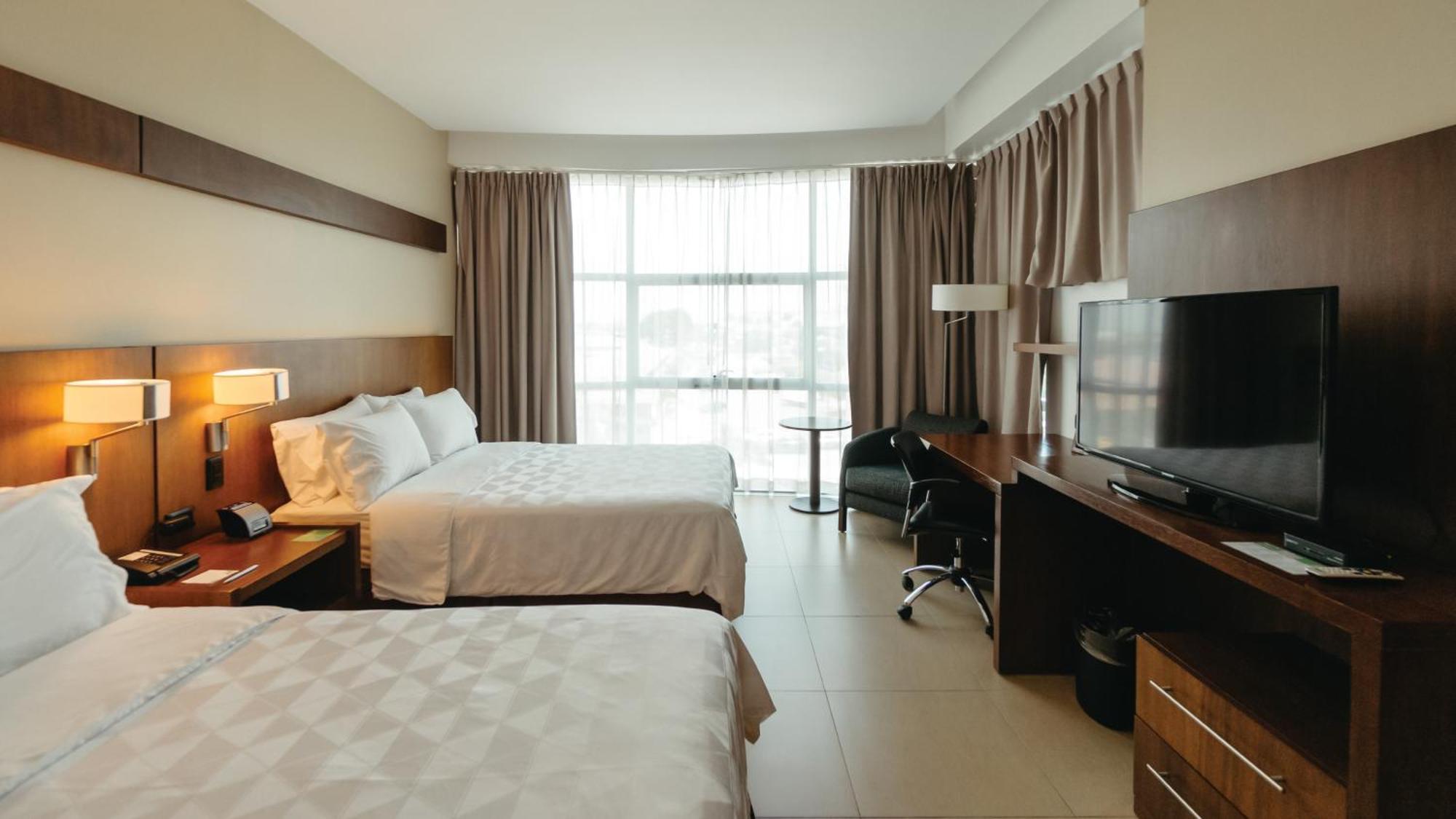ฮอลิเดย์อินน์ กวายากิล แอร์พอร์ต ภายนอก รูปภาพ A room at the hotel